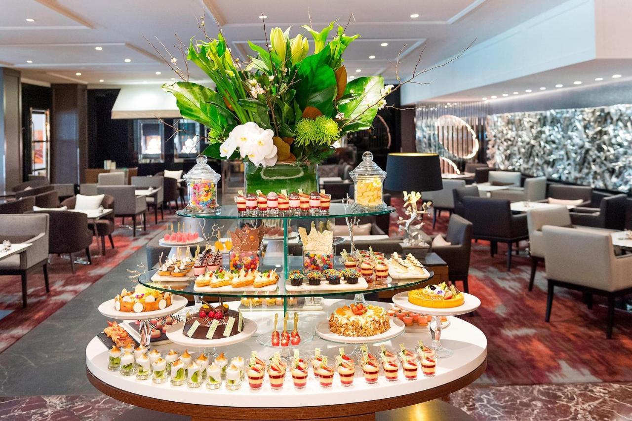 Sheraton Grand Sydney Hyde Park Zewnętrze zdjęcie The Lounge at the airport